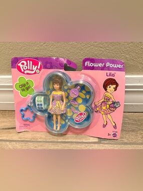 NIB,Polly Pocket Flower Power Lila in clip on compact, 2003